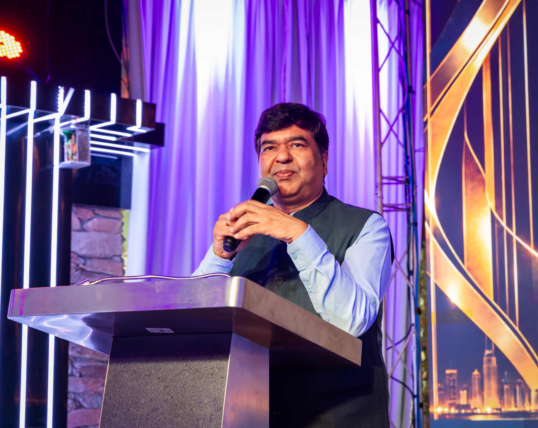 CS Vijay Ojha speaking on stage at IBS Dubai 2026